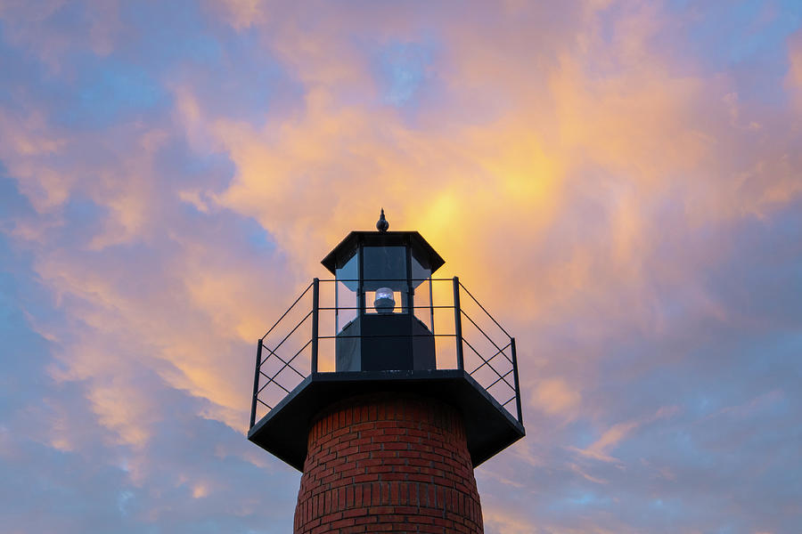 Lighthouse at Sunset Photograph by Carolyn Hutchins
