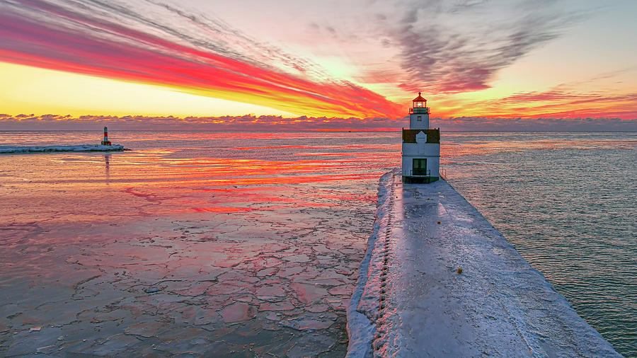 Lighthouse beacon amid fiery red twilight Photograph by James Brey ...