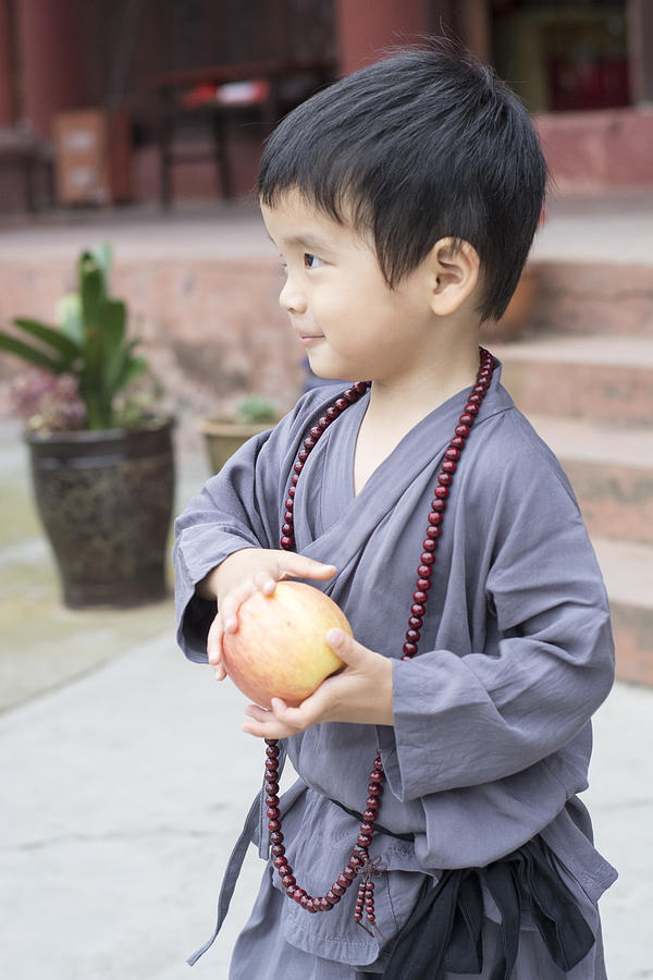 Little Happy Apprentice Monk And Apple #1 Photograph by W6