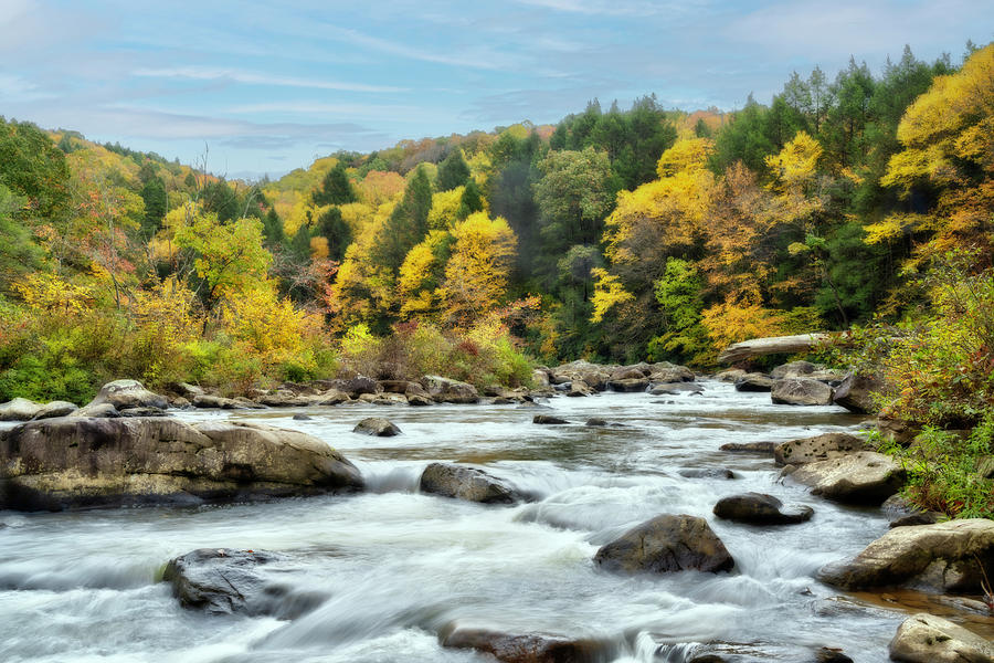 Looking up stream on the Big Sandy River colorful fall scenes with green and yellows #1 Photograph by Dan Friend