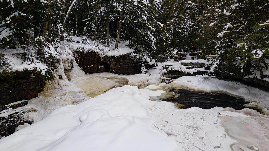 Low view of Canyon Falls in the winter in Michigan #1 Photograph by Eldon McGraw
