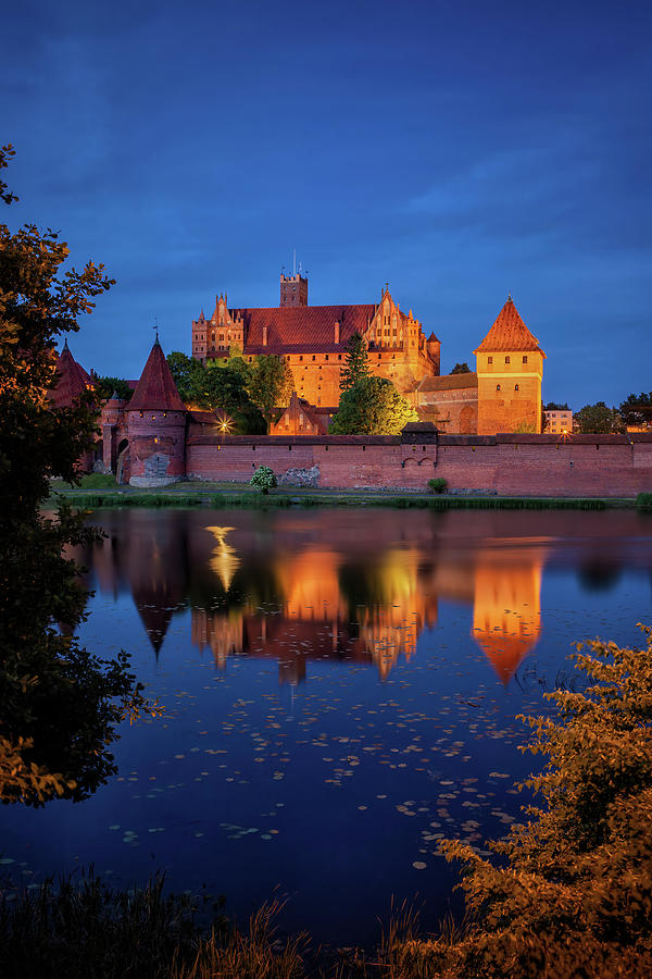 Malbork Castle by Night in Poland #1 Photograph by Artur Bogacki