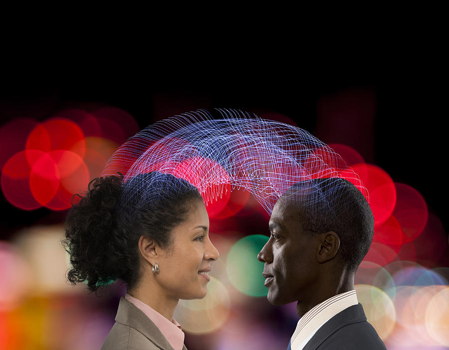 Man and woman communicating using telepathy #1 Photograph by John M Lund Photography Inc