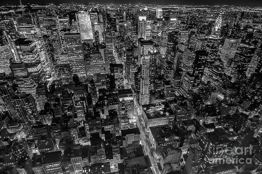 Manhattan at night in black and white Photograph by Patricia Hofmeester