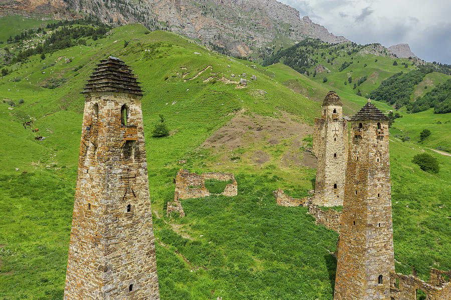 Medieval tower complex in mountains #1 Photograph by Mikhail Kokhanchikov