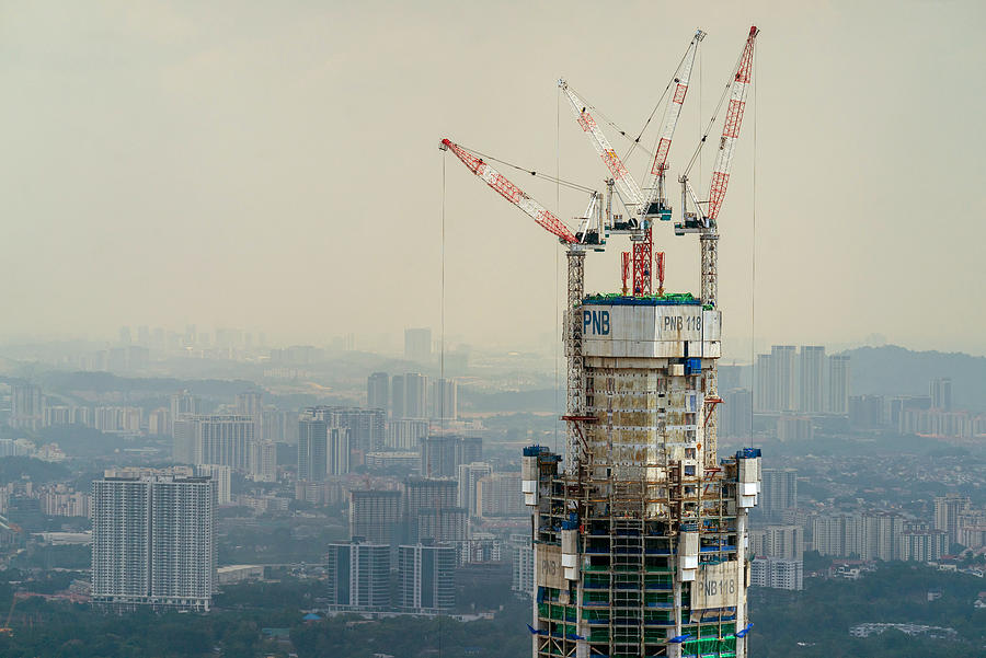 Menara PNB 118 under construction in Kuala Lumpur, Malaysia. #1 Photograph by Shaifulzamri