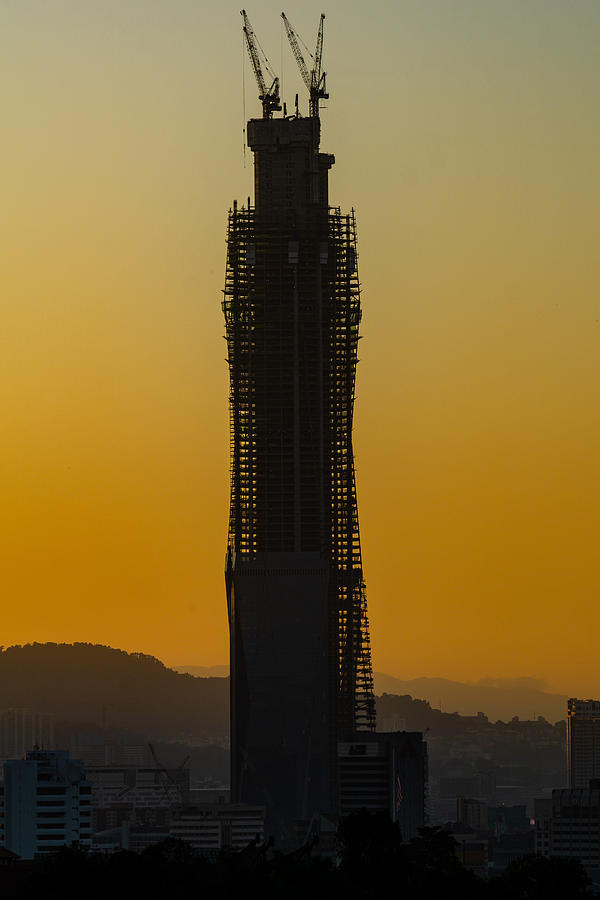 Merdeka118 is a 118-story, 644-metre mega tall skyscraper currently under construction in Kuala Lumpur, Malaysia. #1 Photograph by Shaifulzamri