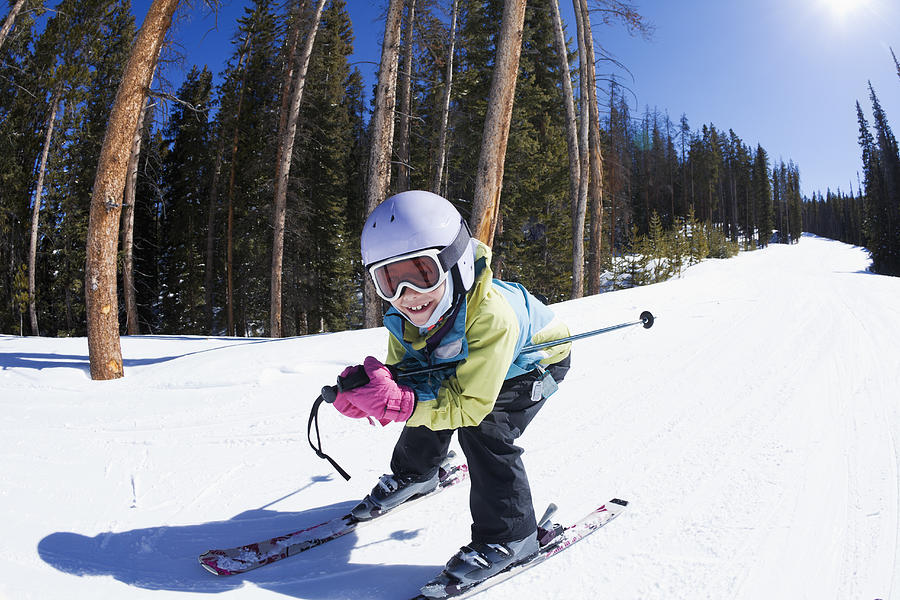 Mixed race girl skiing downhill #1 Photograph by Don Mason