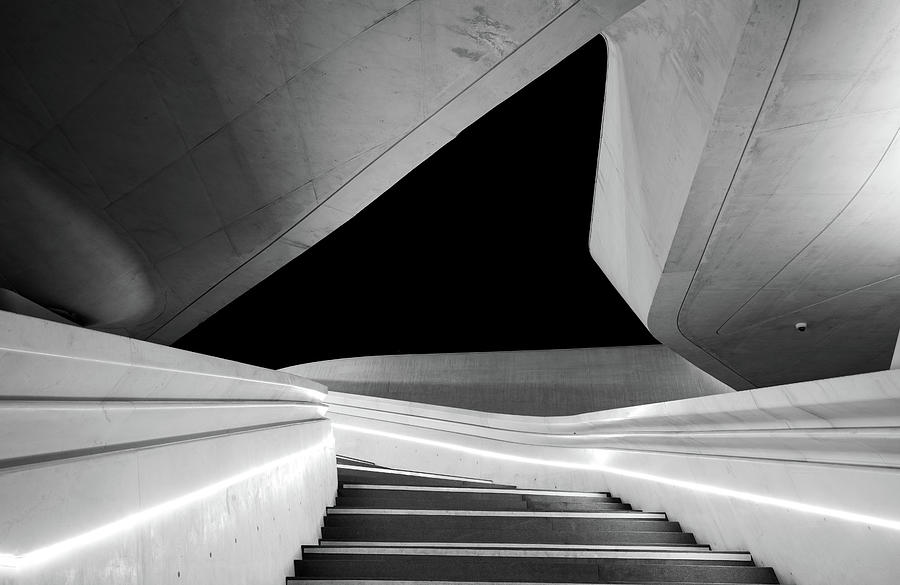 Modern architecture and empty staircase leading to a bright open space. Photograph by Michalakis Ppalis
