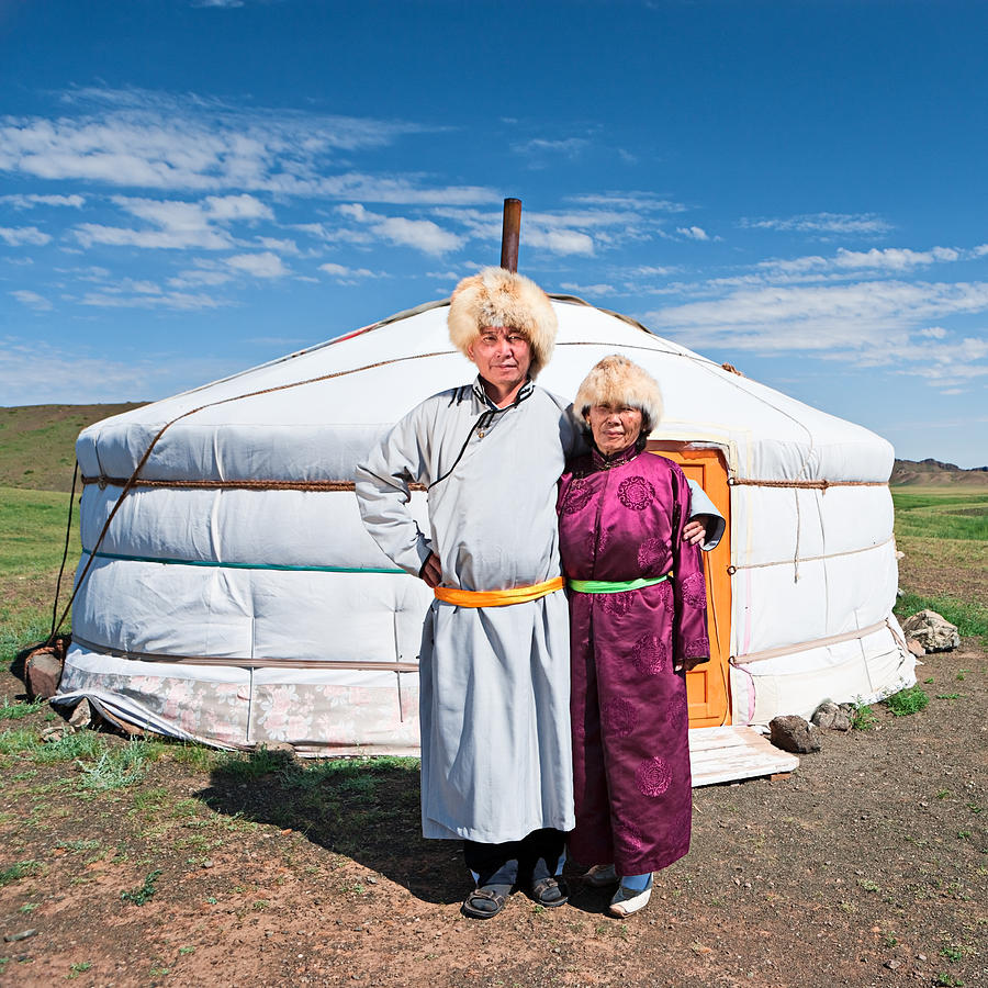 Mongolian couple in national clothing #1 Photograph by Hadynyah