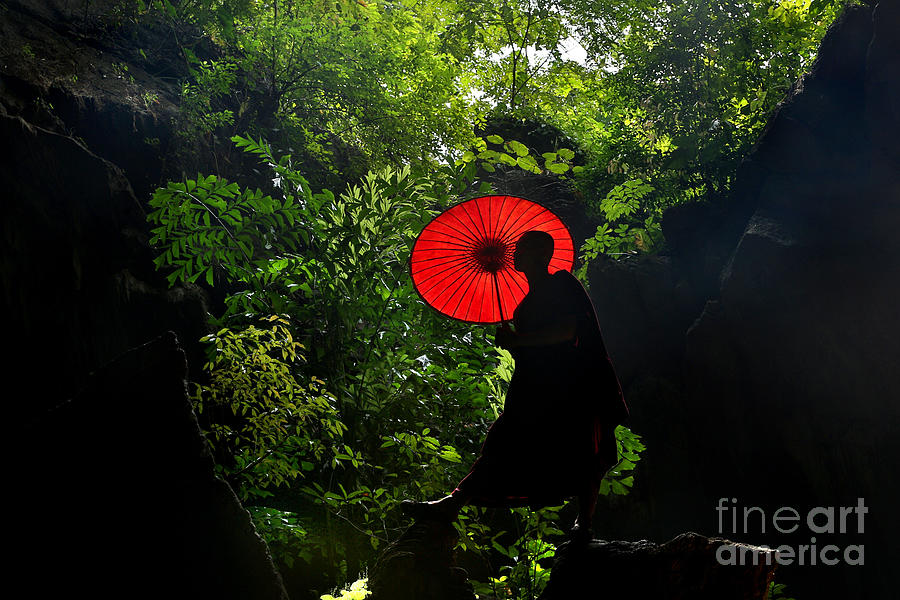 Monk With Red Umbrella In Enormous Sunlit Cave Photograph