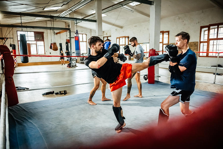 Muay thai boxing athletes training in boxing ring #1 Photograph by Tom Werner
