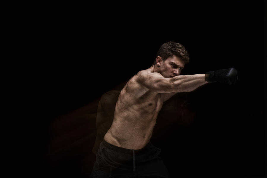 Multiple Exposure - Muscular man fighting #1 Photograph by 4x6