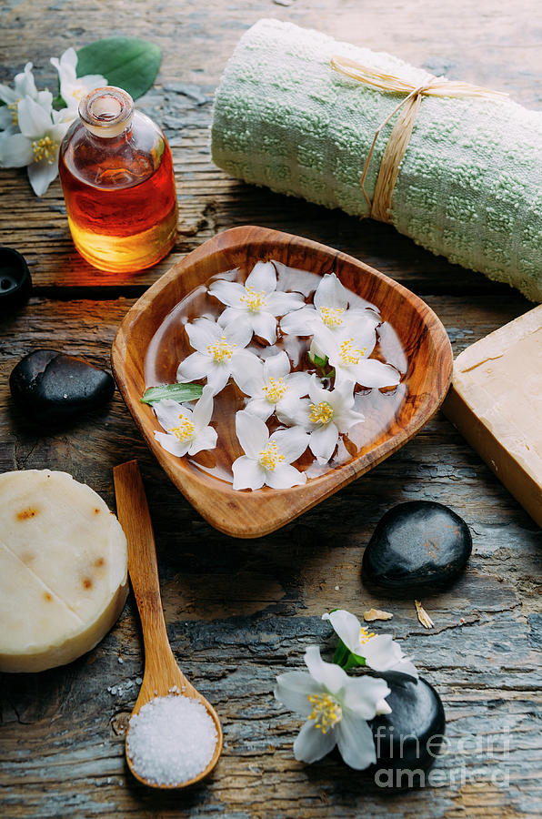 Natural spa cosmetics with essential massage oils, jasmine flowe Photograph by Jelena Jovanovic