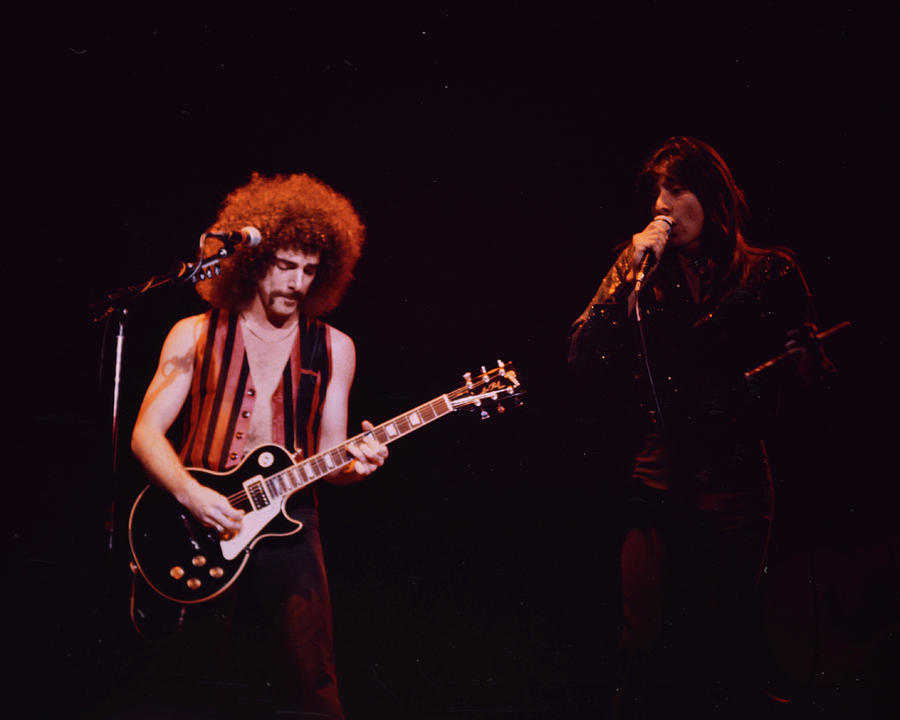 Concert Photograph - Neal Schon, and Steve Perry of Journey. December, 1983. #1 by Dan Cuny