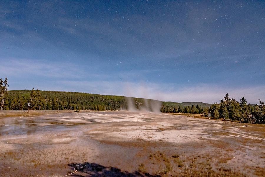 Night Photo Os Old Faithful Geisers In Yellowstone National Park #1 Photograph by Alex Grichenko