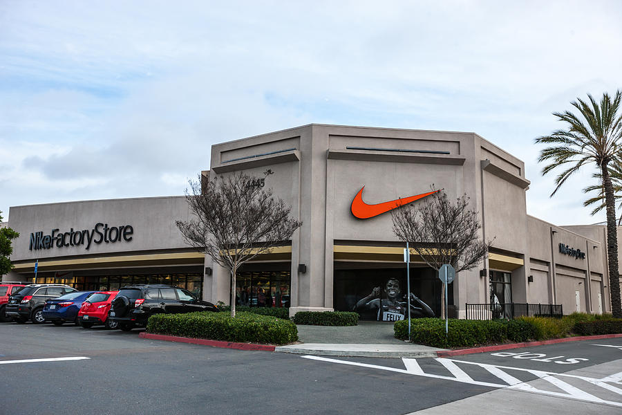 Nike factory outlet in Las Americas shopping mall, San Diego, USA #1 Photograph by Anouchka