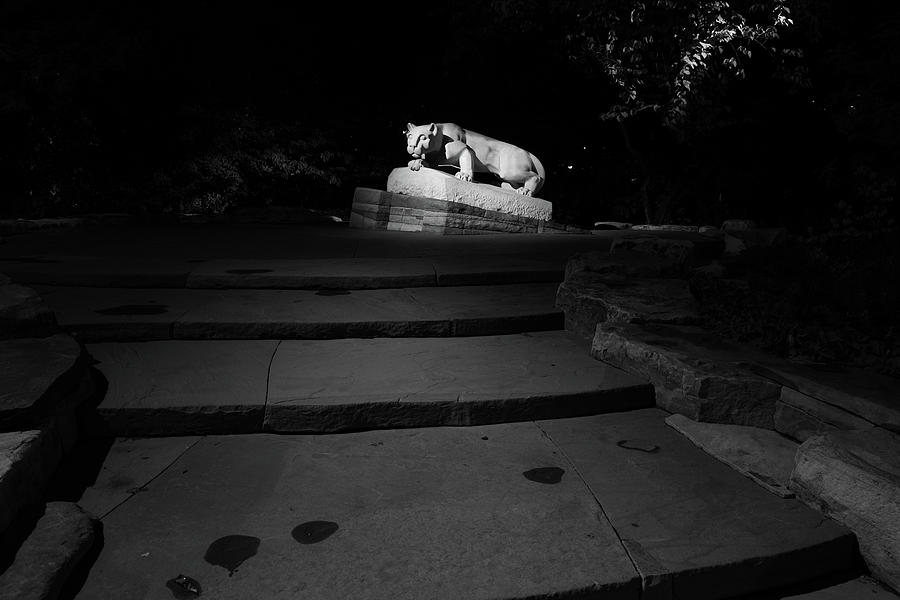 Nittany Lion Shrine at night at Penn State University in black and white #1 Photograph by Eldon McGraw