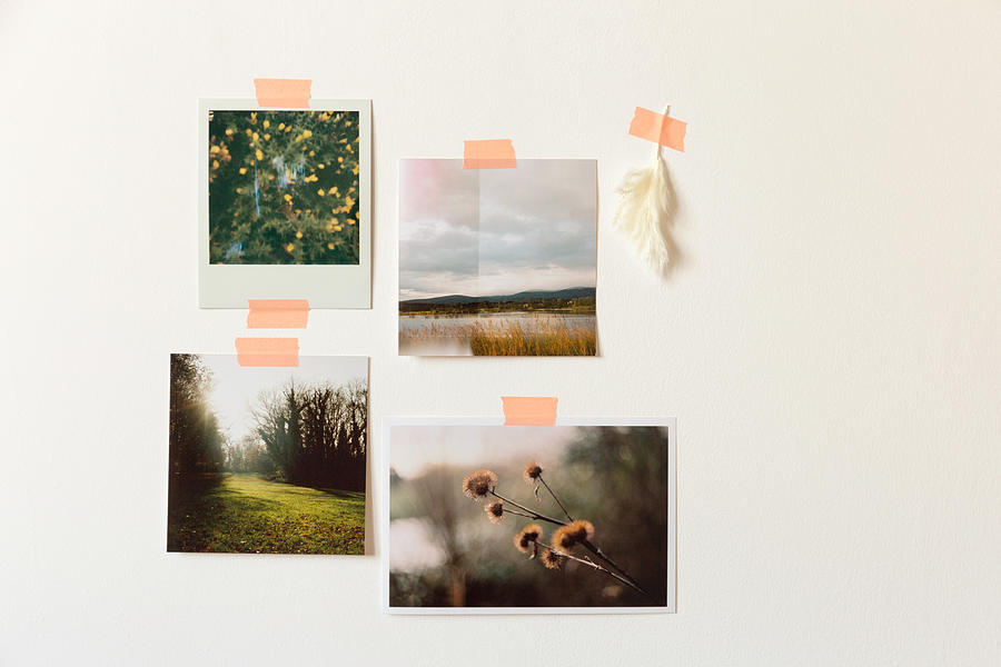 Nostalgic printed photos taped to wall #1 Photograph by Miss Pearl