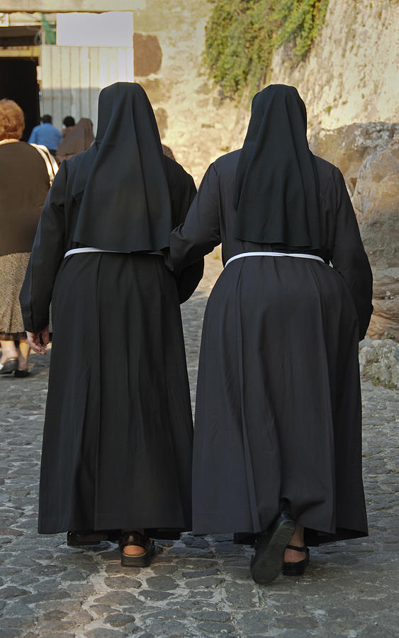 Nuns walking to church in Lipari, Sicily #1 Photograph by Dallas Stribley