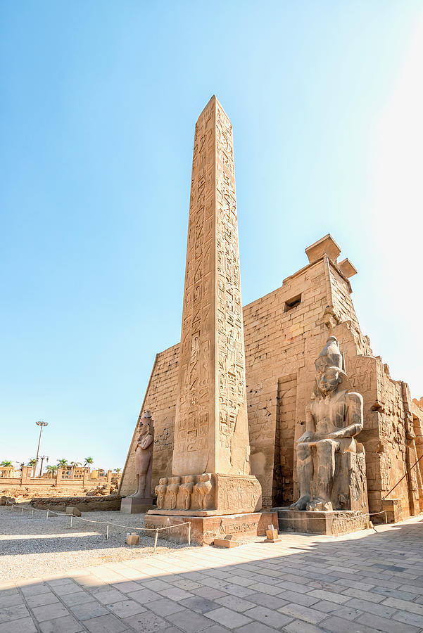 Obelisk And Statue Photograph