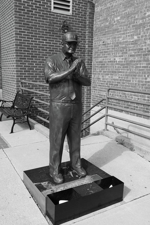 Ohio State football coach Woody Hayes statue in black and white #1 Photograph by Eldon McGraw