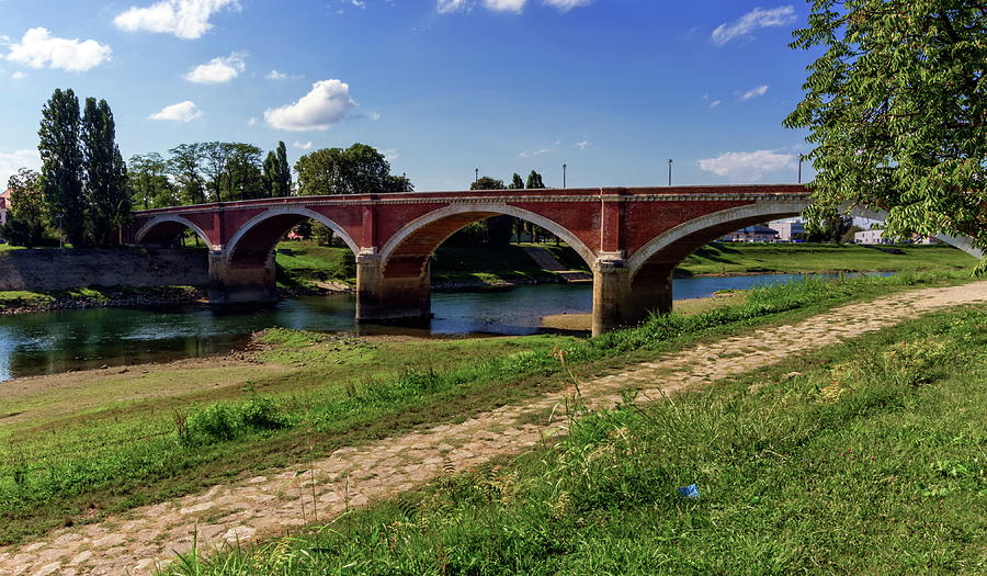Old bridge over the Kupa river in Sisak, Croatia #1 Photograph by Elenarts - Elena Duvernay photo