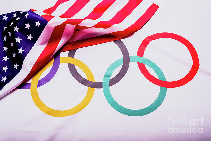 Olympic Flag Folded Under The American Flag After Collecting The Materials For The Olympic Games Aft Photograph