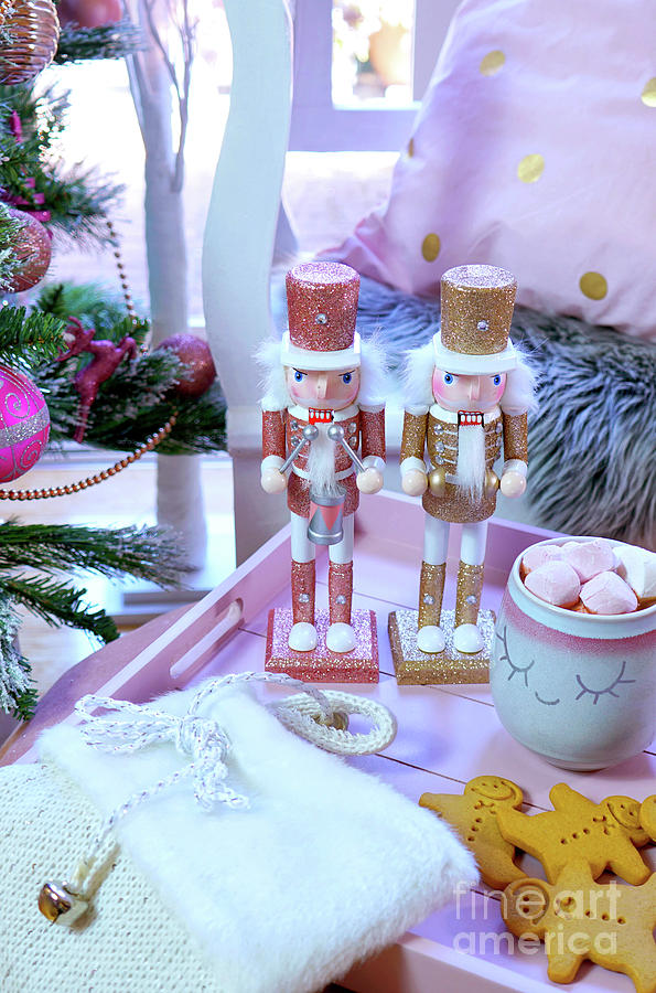 On trend pink and rose gold trimmed Christmas tree with tray for Santa. #1 Photograph by Milleflore Images