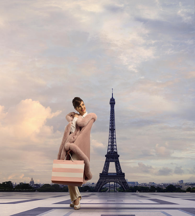 Pacific Islander woman walking near Eiffel Tower, Paris, Ile #1 Photograph by Colin Anderson Productions pty ltd