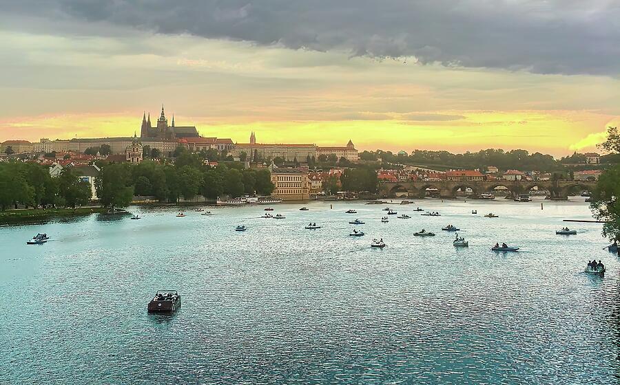 Paddle boats on the Vitava River at sunset in Prague, Czechia Photograph by Mike Worley Paddle boats on the Vitava River at sunset in Prague, Czechia Photograph by Mike Worley