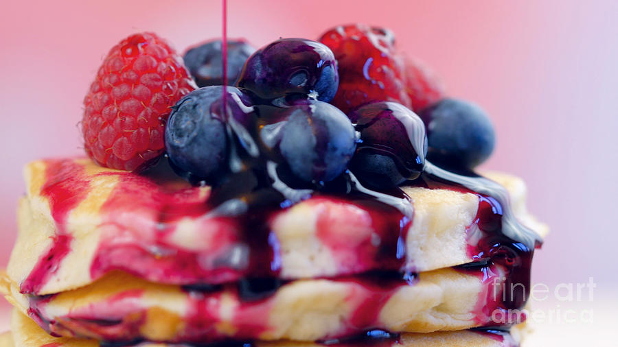 Tea Photograph - Pancakes with berries and drizzled with blueberry maple syrup, macro closeup. #1 by Milleflore Images