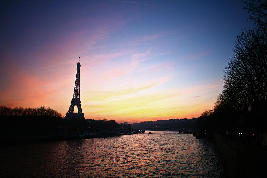 Paris the eiffel tower at sunset and the Seine river Photograph by Jean ...