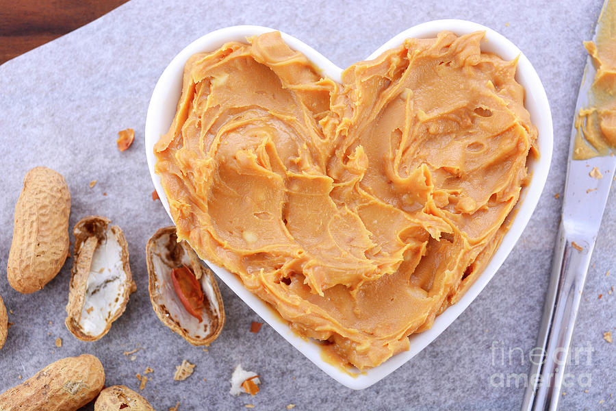 Bowl Photograph - Peanut Butter in Heart Dish #1 by Milleflore Images