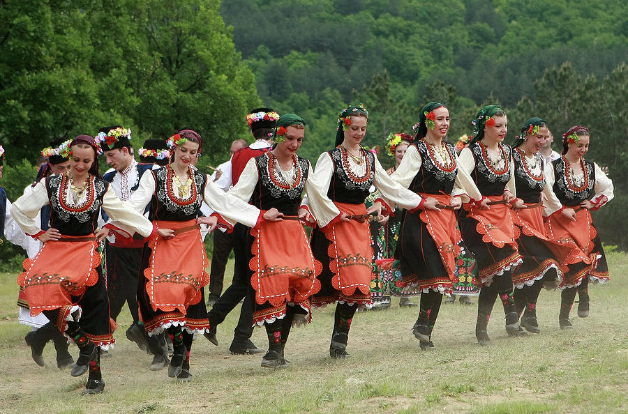 People in traditional costumes dance bulgarian horo Photograph by ...