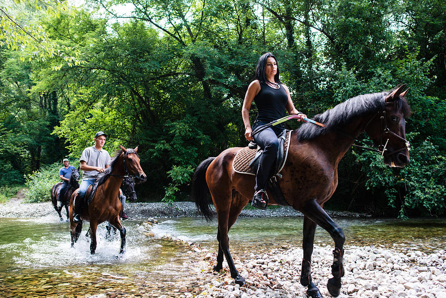 People Riding Horseback Together #1 Photograph by Bluecinema