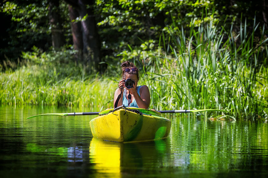 Photographer on vacation in a kayak #1 Photograph by ewg3D