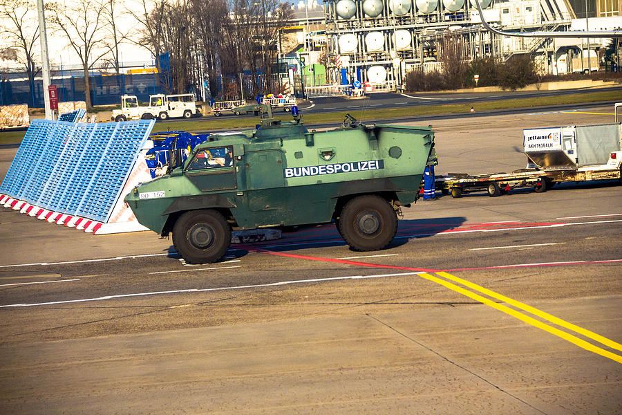 Police armored  protection vehicle in International Frankfurt Airport, #1 Photograph by Flik47
