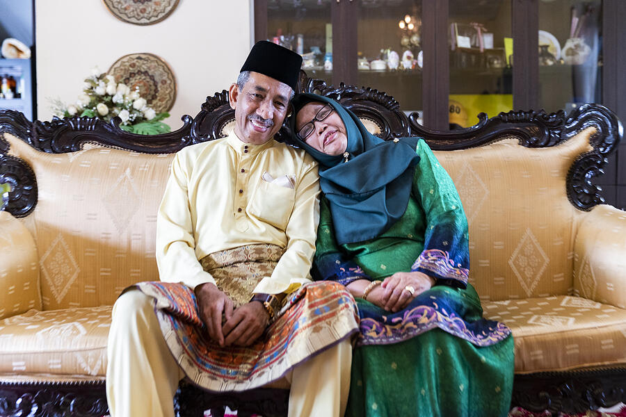 Portrait of a Mature Malaysian Couple #1 Photograph by GCShutter