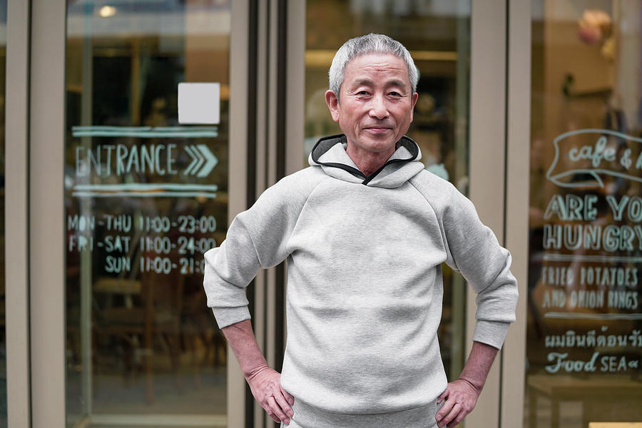 Portrait of a senior Japanese man #1 Photograph by JGalione