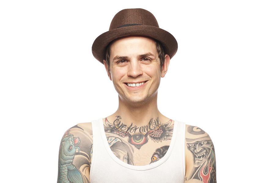 Portrait of a smiling tattooed man #1 Photograph by Alvarez