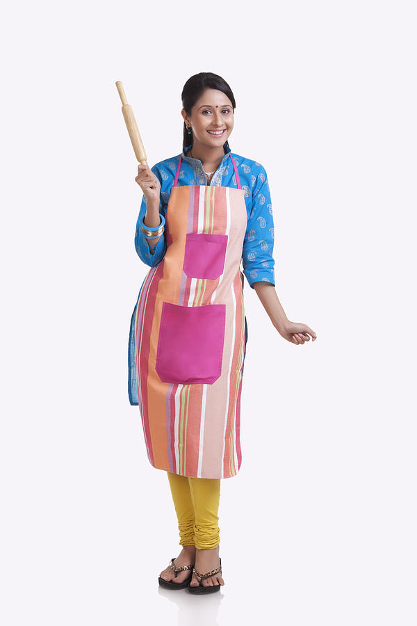 Portrait of a young WOMEN wearing an apron #1 Photograph by Sudipta Halder