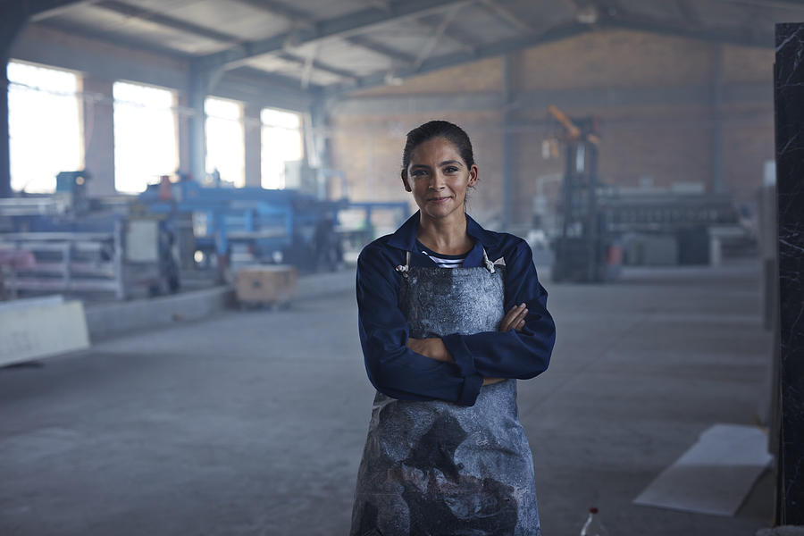 Portrait of female worker at factory #1 Photograph by Klaus Vedfelt