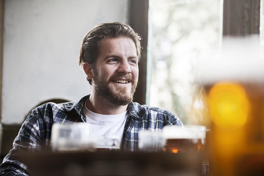 Portrait of man in a pub #1 Photograph by Henrik Sorensen