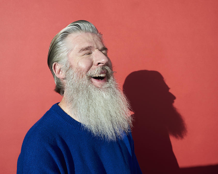 Portrait of mature man smiling #1 Photograph by Flashpop