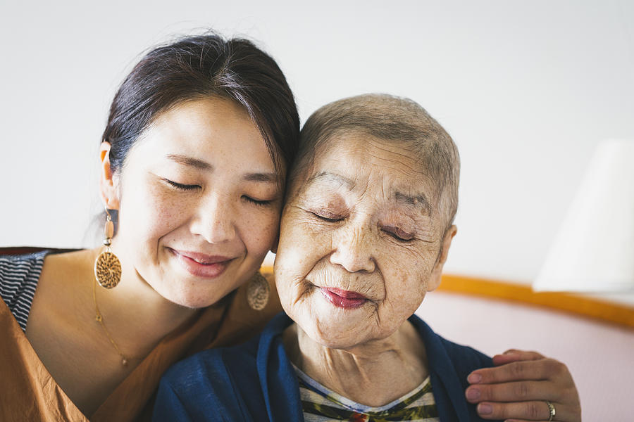 Portrait of old mother with cancer and her middle aged daughter #1 Photograph by Kohei Hara