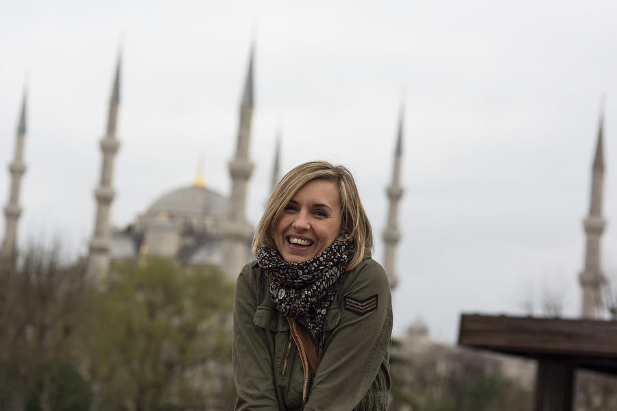 Pretty traveller woman - Blue mosque (Sultanahmet) in the background #1 Photograph by Ruzgar344