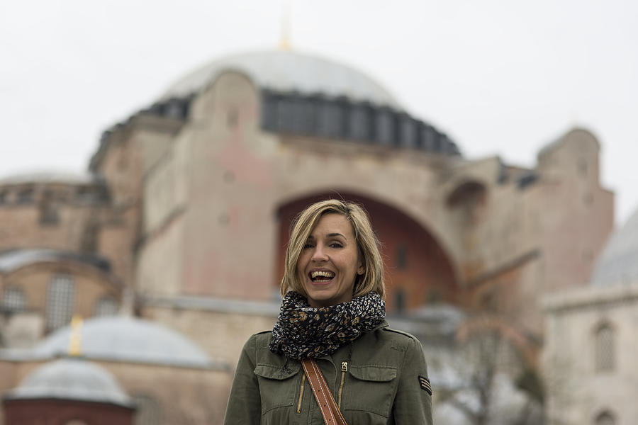 Pretty traveller woman - Hagia Sophia Museum in the background #1 Photograph by Ruzgar344