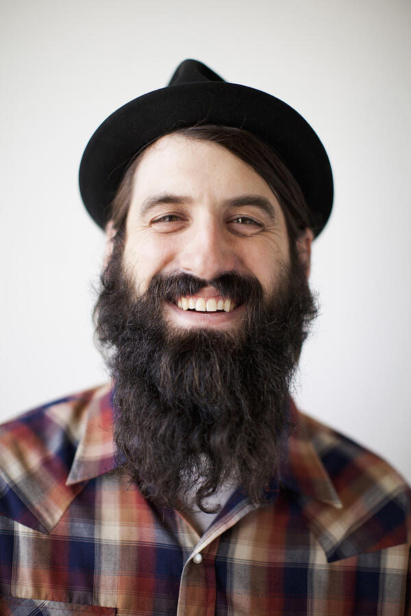 Profile of male character wearing long beard, hat and lumberjack shirt #1 Photograph by Jessica Peterson