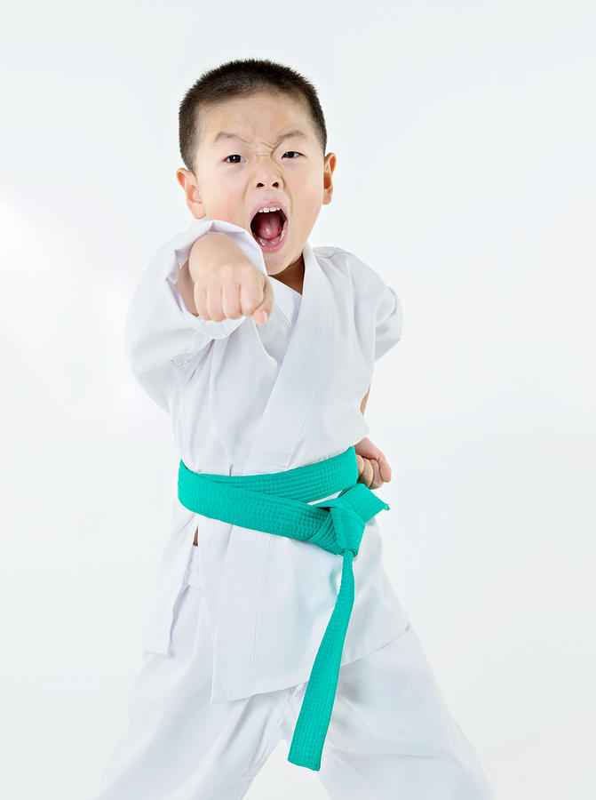 Punching boy #1 Photograph by Baona